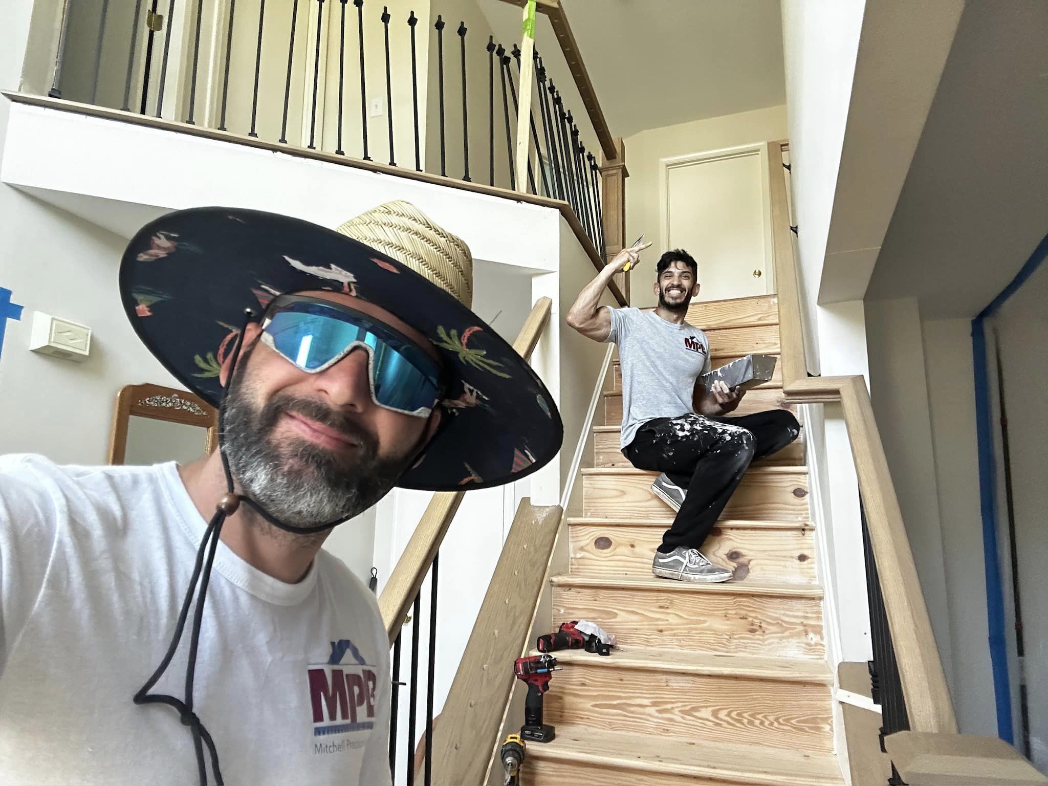 Family and team group photo from Mitchell Precision Builders.